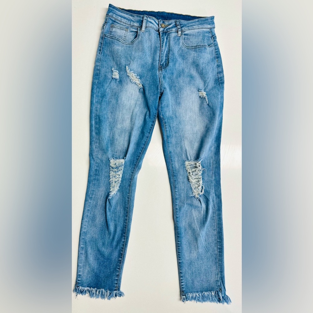 Distressed women’s jeans